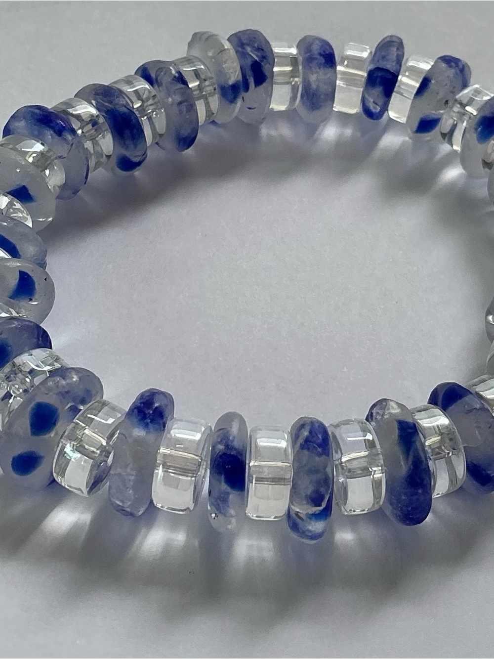 Hand Crafted Blue and Clear Glass Disc Stretch Bracelet